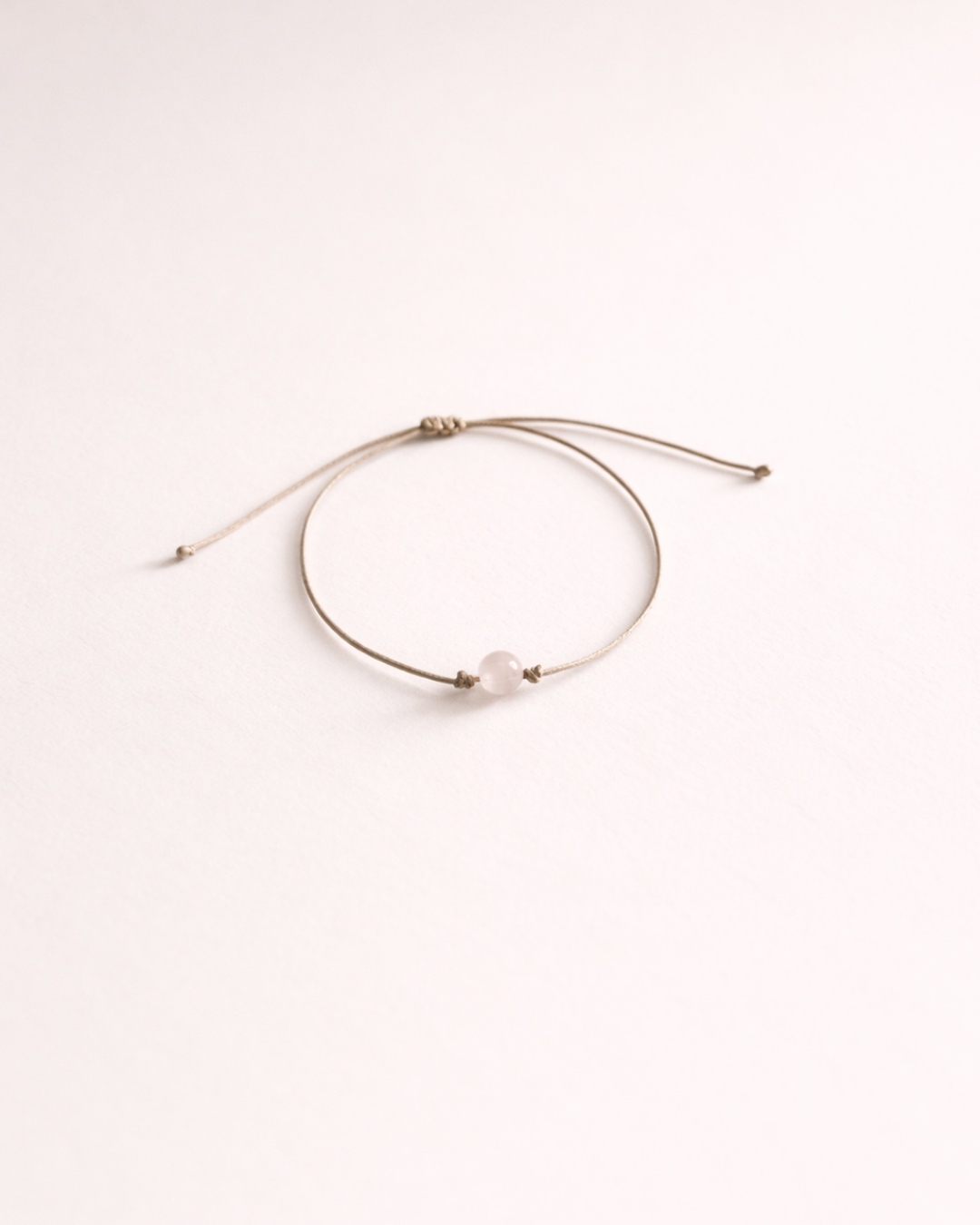Pulsera de cuarzo rosa incluida con vela Plenitud