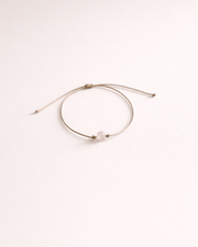 Pulsera de cuarzo rosa incluida con vela Plenitud