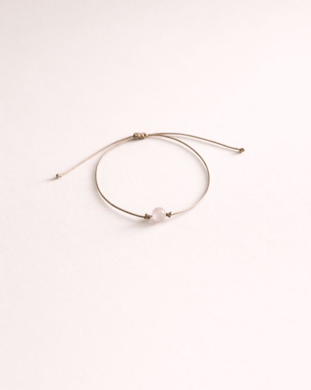 Pulsera de cuarzo rosa incluida con vela Plenitud