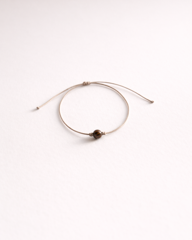 Pulsera de ojo de tigre incluida con vela Poder